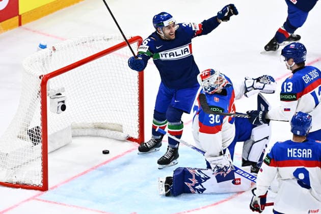 L-R Cristiano Di Giacomo (ITA) celebrating a goal and goalkeeper Adam Gajan (SVK) are seen during the 2026 IIHF World Championship, WM, Weltmeisterschaft Group B, match Italy vs Slovakia, on May 17, 2026, Fribourg, Switzerland. (CTKxPhoto RadekxPetrasek) CTKPhotoP2026051703520  CTKPhotoP2026051703520