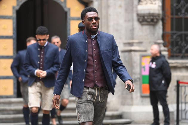 Arrival in traditional costume, lederhosen Alphonso DAVIES Bayern Muenchen, championship celebration FC Bayern Muenchen on the town hall balcony on Marienplatz in Munich on 17 05 2026 Soccer 1 Bundesliga season 2025 2026, 34 match day,