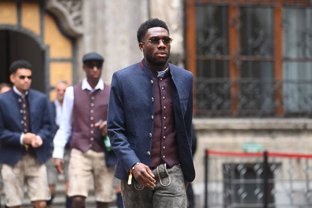 Arrival in traditional costume, lederhosen Alphonso DAVIES Bayern Muenchen, championship celebration FC Bayern Muenchen on the town hall balcony on Marienplatz in Munich on 17 05 2026 Soccer 1 Bundesliga season 2025 2026, 34 match day,