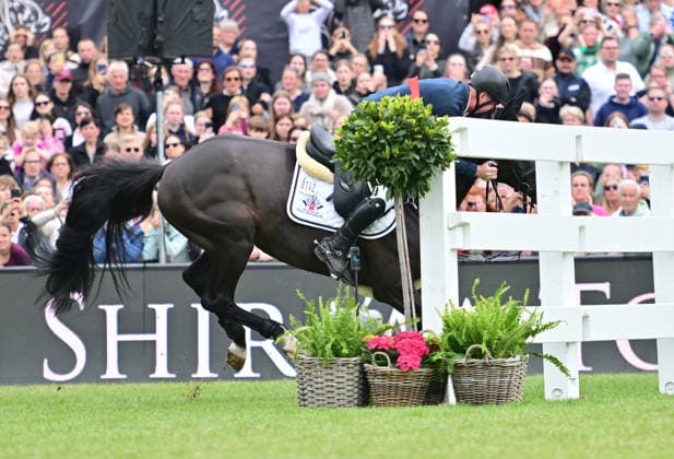 GER Al Shira aa German Jumping Dressage Derby Hamburg, Al Shira aa 95 German Jumping Derby 17 05 2026, GER Al Shira aa German Jumping Dressage Derby Hamburg, PAl Shira aa 95 German Jumping Derby presented by Melitta CSI4 Al Shira aa Derby Tour Final in picture Michael Grimm GER on Duplexx almost stumbles after the wall nordphotoxGmbH xWitke nph00002