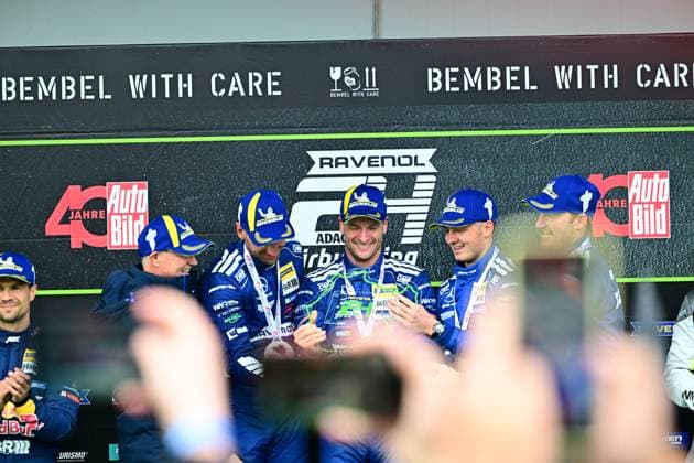 The Mercedes AMG GT3 of Mercedes AMG Team RAVENOL with starting number 80 celebrates on the podium of the 24h Nürburgring The team with Maro Engel and Fabian Schiller proudly presents the winners trophy with champagne Celebration Mercedes AMG Team RAVENOL Award ceremony on the podium of the 24h Nürburgring Copyright: xMichaelxGelhardtx