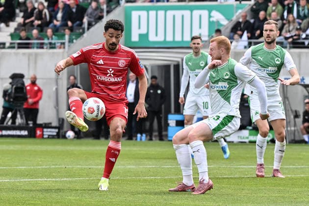 FUERTH, GERMANY - 17. MAI: tackle between Emmanuel IYOHA (Fortuna Düsseldorf 19) and Paul WILL (SpVgg Greuther Fürth 13) during the 2. Bundesliga Match between SpVgg Greuther Fuehrt vs. Fortuna Duesseldorf at Matchday 34 at Sportpark Ronhof Thomas Sommer DFL REGULATIONS PROHIBIT ANY USE OF PHOTOGRAPHS AS IMAGE SEQUENCES AND OR QUASI-VIDEO Copyright: xBEAUTIFULxSPORTS Goldbergx