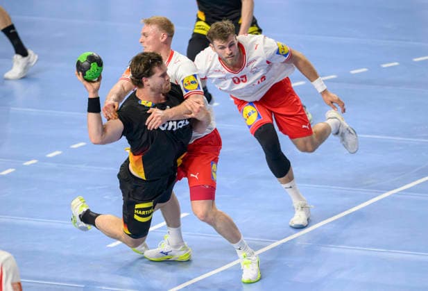 l r Johannes Golla GER , Emil Bergholt DEN , Steven JACOBSEN DEN , action, duel men handball international match, Germany GER Denmark DEN , on 17 05 2026 in Cologne Germany Lanxess Arena