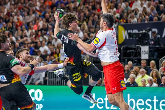 17 05 2026, xkwix, handball, international match, Germany Denmark , Lanxess Arena in Cologne Nils Lichtlein Germany 03 throwing and tackling Emil Bergholt Denmark 33 Photo xKamilxWilkowskixPressefotoKochx Nordrhein Westfalen Germany