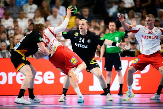 Koeln Handball Laenderspiel Deutschland Daenemark f li in duel Lukas Stutzke Germany and Daenemarks Simon Pytlick, Justus Fischer Germany Koeln Lanxess Arena Germany
