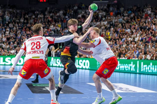 17 05 2026, xkwix, Handball, international match, Germany Denmark , Lanxess Arena in Cologne Nils Lichtlein Germany 03 throwing and tackling Niclas Vest Kirkelokke Denmark 3 and Lasse Andersson Denmark 28 Photo xKamilxWilkowskixPressefotoKochx Nordrhein Westfalen Germany