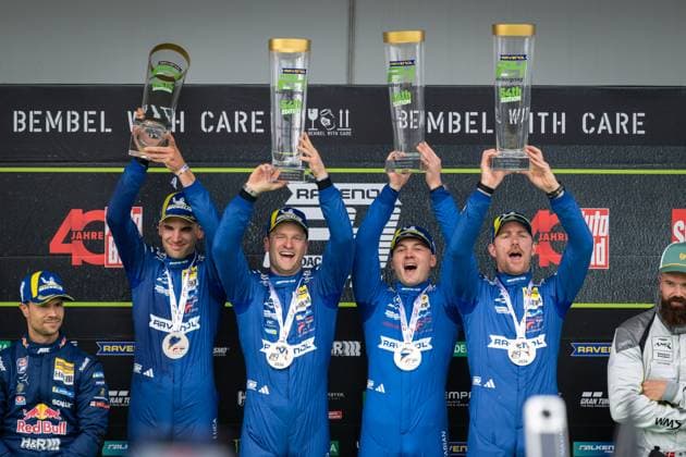 The drivers of Mercedes AMG Team RAVENOL celebrate their victory at the 24h Nürburgring 2026 on the podium Luca Stolz, Maro Engel, Maxime Martin and Fabian Schiller hold up their trophies and medals as they pay tribute to their successful performance in the 24-hour endurance race Mercedes AMG Team RAVENOL 80 wins 24h Nürburgring 2026 Copyright: xMichaelxGelhardtx