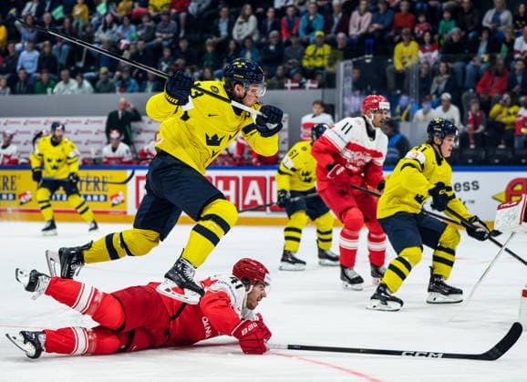 260517 Lucas Raymond of Sweden and Jesper Jensen Aabo during the 2026 IIHF Ice Hockey World Championship match between Denmark and Sweden on May 17, 2026 in Fribourg Photo Jesper Zerman BILDBYRAN kod JZ JZ0716 ishockey ice hockey ishockey vm 2026 vm 2026 iihf world championship danmark denmark sverige sweden bbeng  Copyright: JESPERxZERMAN BB260517JZ032
