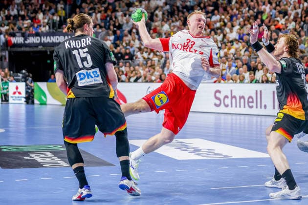 17 05 2026, xkwix, handball, international match, Germany Denmark , Lanxess Arena in Cologne Emil Bergholt Denmark 33 at goal throw and duel against Juri Knorr Germany 15 Photo xKamilxWilkowskixPressefotoKochx Nordrhein Westfalen Germany