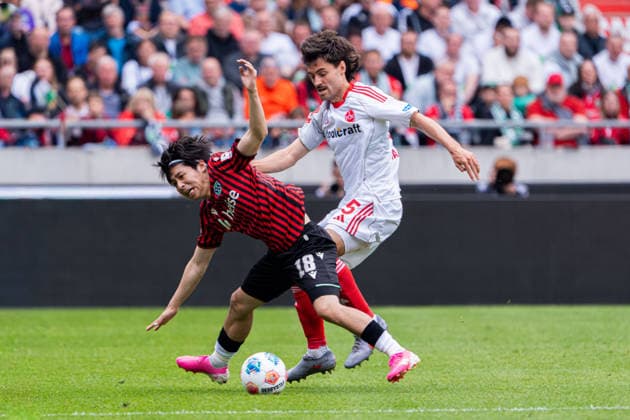 Hannover, Germany 17 May 2026 2 BL 2025 2026 Sp 34 Hannover 96 v 1 FC Nürnberg In picture from left in duel Daisuke Yokota HAN and Tom Baack FCN DFL DFB regulations prohibit any use of photographs as image sequences and or quasi video Heinz von Heiden Arena Niedersachsen Copyright: xFotostandx xKruczynskix
