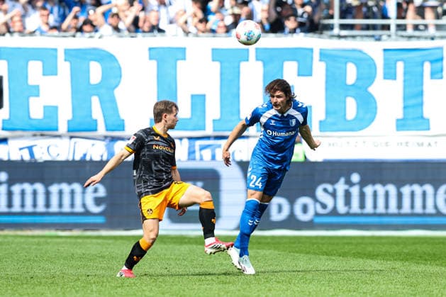 Jean Hugonet 1 FC Magdeburg,24 vs Daniel Hanslik 1 FC Kaiserslautern,19 2 Soccer Bundesliga Season 2025 2026 1 FC Magdeburg vs 1 FC Kaiserslautern at the Avnet Arena in Magdeburg Action,Soccer,Man,Men,Germany,17 05 2026
