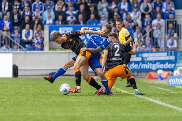Germany 2 Bundesliga, Matchday 34, Season 2025 2026, 1 FC Magdeburg vs 1 FC Kaiserslautern Avnet Arena Magdeburg Atik Baris 1 FC Magdeburg, 23 in duel against Skyttä Naatan 1 FC Kaiserslautern, 15 , Asta Simon 1 FC Kaiserslautern, 2 Copyright: xMichellexLukax