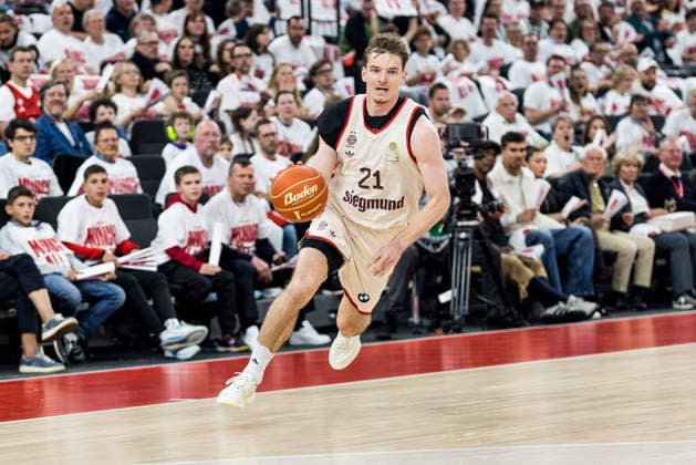 MUNICH, GERMANY - MAY 17: Justus Hollatz (FC Bayern Muenchen, 21) controls the ball during the easyCredit Basketball Bundesliga Playoffs Quarterfinal Game 1 between FC Bayern Muenchen vs. Vet-Concept Gladiators Trier at SAP Garden on match 1 of the Playoffs Quarterfinals Best of Five of easyCredit Basketball Bundesliga on May 17, 2026 in Munich, Germany. Bavaria Germany Copyright: xSteffiexWunderlx