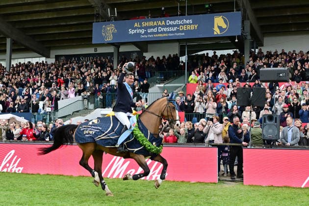 GER Al Shira aa German Jumping Dressage Derby Hamburg, Al Shira aa 95 German Jumping Derby 17 05 2026, GER Al Shira aa German Jumping Dressage Derby Hamburg, PAl Shira aa 95 German Jumping Derby presented by Melitta CSI4 Al Shira aa Derby Tour Final in the picture winner Frederic Tillmann GER on DSP Comanche VL on the lap of honor nordphotoxGmbH xWitke nph00002