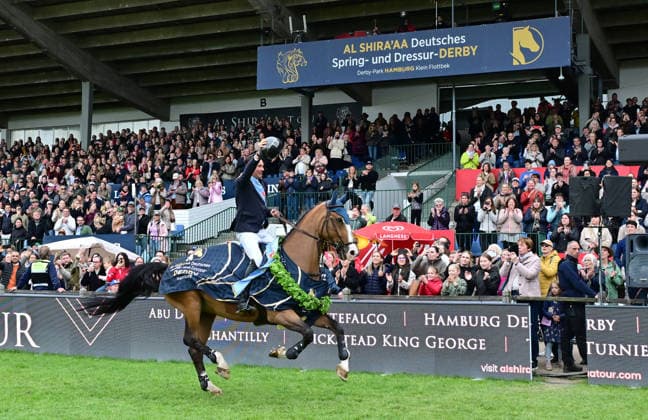 GER Al Shira aa German Jumping Dressage Derby Hamburg, Al Shira aa 95 German Jumping Derby 17 05 2026, GER Al Shira aa German Jumping Dressage Derby Hamburg, PAl Shira aa 95 German Jumping Derby presented by Melitta CSI4 Al Shira aa Derby Tour Final in the picture winner Frederic Tillmann GER on DSP Comanche VL on the lap of honor nordphotoxGmbH xWitke nph00002