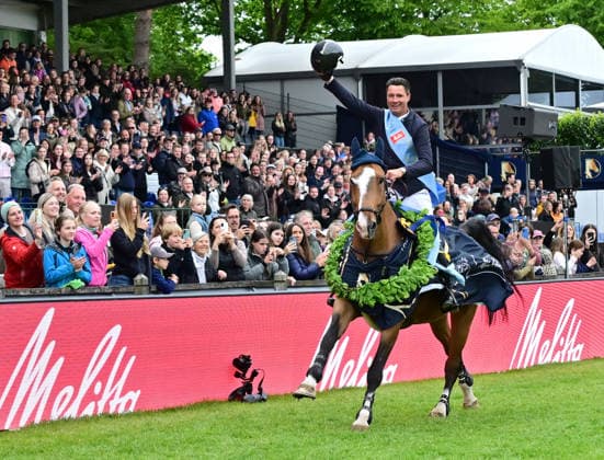 GER Al Shira aa German Jumping Dressage Derby Hamburg, Al Shira aa 95 German Jumping Derby 17 05 2026, GER Al Shira aa German Jumping Dressage Derby Hamburg, PAl Shira aa 95 German Jumping Derby presented by Melitta CSI4 Al Shira aa Derby Tour Final in the picture winner Frederic Tillmann GER on DSP Comanche VL on the lap of honor nordphotoxGmbH xWitke nph00002