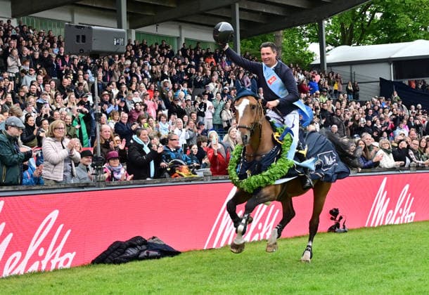 GER Al Shira aa German Jumping Dressage Derby Hamburg, Al Shira aa 95 German Jumping Derby 17 05 2026, GER Al Shira aa German Jumping Dressage Derby Hamburg, PAl Shira aa 95 German Jumping Derby presented by Melitta CSI4 Al Shira aa Derby Tour Final in the picture winner Frederic Tillmann GER on DSP Comanche VL on the lap of honor nordphotoxGmbH xWitke nph00002