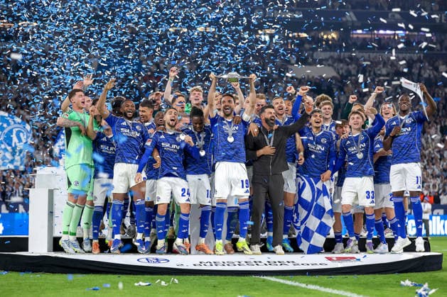 17 05 2026, Football, FC Schalke 04 Eintracht Braunschweig, 34 Matchday, 2 Bundesliga, Veltins Arena Gelsenkirchen, Season 2025 2026 Schalke 04 is champion of the 2 Bundesliga The team wins the championship and stands cheering on the pitch Joy and emotions after the victory Kenan Karaman Schalke04 19 center with the championship trophy at the award ceremony next to head coach Miron Muslic Schalke04 DFB regulations prohibit any use of photographs as image sequences and or quasi video North Rhine-Westphalia Germany