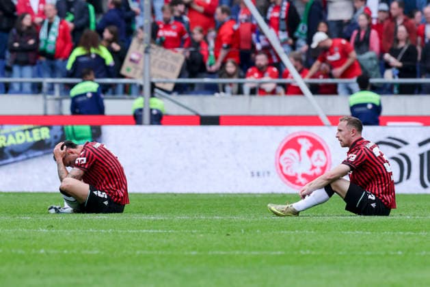 Virgil Ghita Hannover 96 and Maurice Neubauer Hannover 96 look dejected, 2 Bundesliga, Hannover 96 v 1 FC Nuremberg, Heinz von Heiden Arena on May 17, 2026 in Hanover, Germany Photo by Marco Steinbrenner DeFodi Images Virgil Ghita Hannover 96 and Maurice Neubauer Hannover 96 look dejected, 2 Bundesliga, Hannover 96 v 1 FC Nuremberg, Heinz von Heiden Arena, May 17, 2026 in Hanover, Germany Photo by Marco Steinbrenner DeFodi Images
