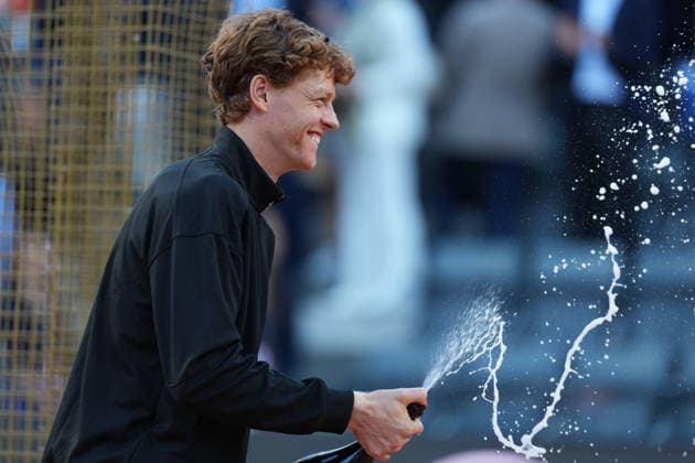 Jannik Sinner of Italy sprays sparkling wine as he celebrates the victory of the Internazionali BNL d Italia 2026 tennis tournament at Foro Italico in Rome (Italy) on May, 17, 2026. AntoniettaxBaldassarre
