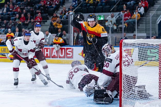 ZURICH, SWITZERLAND - MAY 17: Joshua Samanski (Germany, 44) in some action with Ralfs Freibergs (Latvia, 29), Artus Andzans (Latvia, 5) and Kristers Gudlevskis (Latvia, 50)during the Preliminary Round - Group A Match 15 between Germany and Latvia at the IIHF Ice hockey, Eishockey World Championship, WM, Weltmeisterschaft 2026, Swiss Life Arena on May 17, 2026 in Zurich, Switzerland. Zurich Switzerland Copyright: xTimoxSteinx