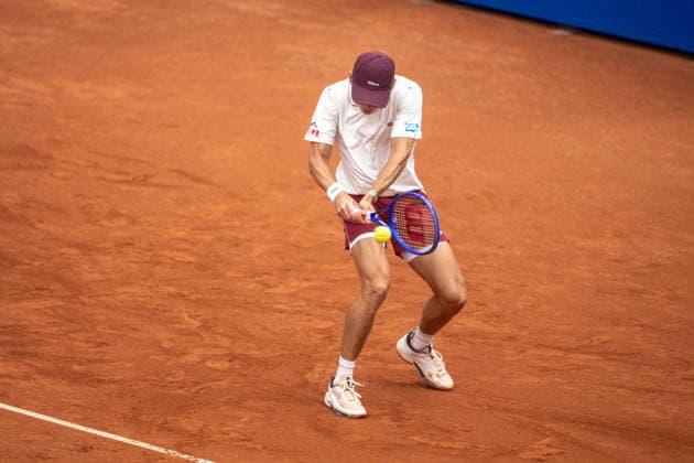 HAMBURG, GERMANY - MAY 18: Alex de Minaur of Australia plays a backhand shot to Francisco Cerundolo during their Men s Singles Round One match at the Bitpanda Hamburg Open on May 18, 2026 in Hamburg, Germany. Credit: Andy Astfalck NurPhoto Germany Copyright: xAndyxAstfalckx