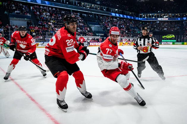 260518 Evan Bouchard of Canada and Mathias From of Denmark during the 2026 IIHF Ice Hockey World Championship match between Canada and Denmark on May 18, 2026 in Fribourg Photo Jesper Zerman BILDBYRAN kod JZ JZ0718 ishockey ice hockey ishockey vm 2026 vm 2026 iihf world championship kanada canada danmark denmark canada kanada bbeng danmark denmark  Copyright: JESPERxZERMAN BB260518JZ075