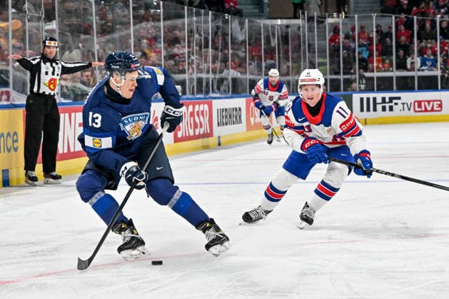 ZURICH, SWITZERLAND MAY 18 Jesse Puljujarvi of Finland in action against Oliver Moore of United States during the 2026 IIHF Ice Hockey World Championship Switzerland game between Finland and USA at Swiss Life Arena on May 18, 2026 in Zurich, Zurich Zurich Swiss Life Arena Zurich Switzerland Copyright: xJustPictures.ch AndreaxBrancax jp-en-EuSpIm-JP7_ANB_Fin_USA_18052026_8824
