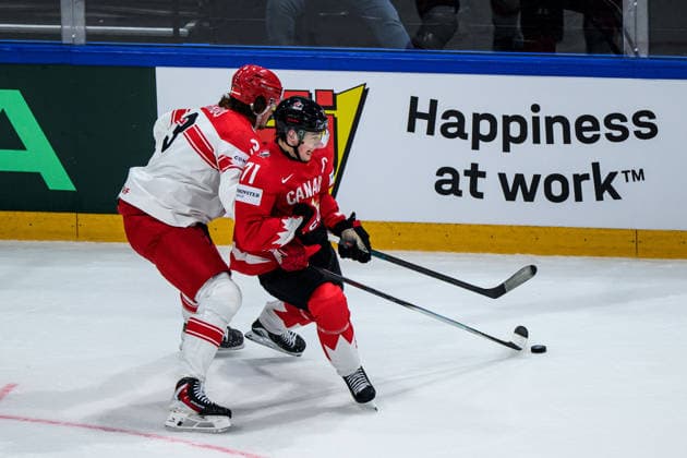 260518 Malte Setkov of Denmark and Macklin Celebrini of Canada during the 2026 IIHF Ice Hockey World Championship match between Canada and Denmark on May 18, 2026 in Fribourg Photo Jesper Zerman BILDBYRAN kod JZ JZ0718 ishockey ice hockey ishockey vm 2026 vm 2026 iihf world championship kanada canada danmark denmark canada kanada bbeng danmark denmark  Copyright: JESPERxZERMAN BB260518JZ084