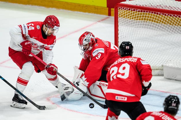 260518 Jet Greaves of Canada and Felix Scheel of Denmark during the 2026 IIHF Ice Hockey World Championship match between Canada and Denmark on May 18, 2026 in Fribourg Photo Jesper Zerman BILDBYRAN kod JZ JZ0718 ishockey ice hockey ishockey vm 2026 vm 2026 iihf world championship kanada canada danmark denmark canada kanada bbeng danmark denmark  Copyright: JESPERxZERMAN BB260518JZ086