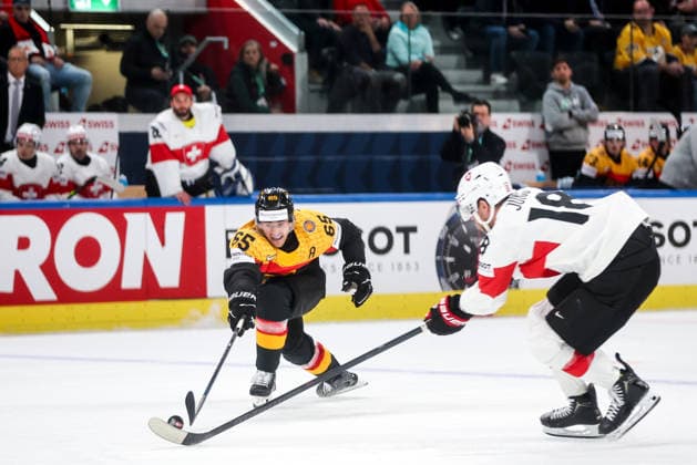 Ice hockey, Eishockey - IIHF WC 2026 ZURICH,SWITZERLAND,18.MAY.26 - ICE HOCKEY - IIHF Ice Hockey World Championship, WM, Weltmeisterschaft 2026, group stage, Germany vs Switzerland. Image shows Marc Michaelis (GER) and Sven Jung (SUI).  GEPAxpictures xMaticxKlansek
