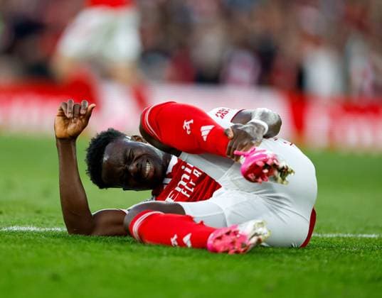 Bukayo Saka of Arsenal holds his ankle after getting fouled Arsenal v Burnley, Football, Premier League, Emirates Stadium, Islington, London, UK - 18 05 2026 EDITORIAL USE ONLY No use with unauthorised audio, video, data, fixture lists, club league logos or live services. Online in-match use limited to 120 images, no video emulation. No use in betting, games or single club league player publications.  Copyright: xMattxImpey Shutterstockx 16882378r