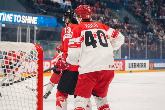 FRIBOURG, FRIBOURG - MAY 18: Gabriel Vilardi of Canada battles with Anders Koch of Denmark during the 2026 IIHF World Championship, WM, Weltmeisterschaft Preliminary Round Group B match between Canada and Denmark at BCF Arena on May 18, 2026 in Fribourg, Fribourg, Switzerland. Copyright: xLivioxBaeriswylx xSPPx Sportspressphoto_SPR149903