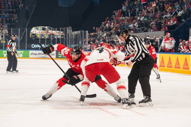 FRIBOURG, FRIBOURG - MAY 18: Players face off during a face-off during the 2026 IIHF World Championship, WM, Weltmeisterschaft Preliminary Round Group B match between Canada and Denmark at BCF Arena on May 18, 2026 in Fribourg, Fribourg, Switzerland. Copyright: xLivioxBaeriswylx xSPPx Sportspressphoto_SPR149905