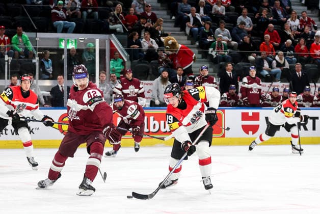 Ice hockey, Eishockey - IIHF WC 2026 ZURICH,SWITZERLAND,19.MAY.26 - ICE HOCKEY - IIHF Ice Hockey World Championship, WM, Weltmeisterschaft 2026, group stage, Austria vs Latvia. Image shows Miks Tumanovs (LAT) and Vinzenz Rohrer (AUT).  GEPAxpictures xMaticxKlansek