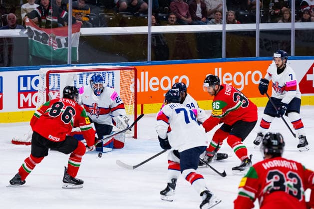 ZURICH, SWITZERLAND - MAY 19: Mat Robson (Great Britain, 20) stops the shot from Csanad Erdely (Hungary, 36) during the Preliminary Round - Group A Match 23 between Hungary and Great Britain at the IIHF Ice hockey, Eishockey World Championship, WM, Weltmeisterschaft 2026, Swiss Life Arena on May 19, 2026 in Zurich, Switzerland. Zurich Switzerland Copyright: xTimoxSteinx