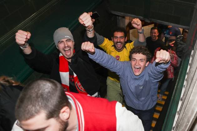 Football, England, FC Arsenal fans celebrate winning the championship