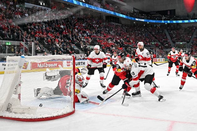 ZURICH, SWITZERLAND MAY 20 Nico Hischier of Switzerland scores a goal against goalkeeper David Kickert of Austria during the 2026 IIHF Ice Hockey World Championship Switzerland game between Austria and Switzerland at Swiss Life Arena on May 20, 2026 in Zurich, Zurich Zurich Swiss Life Arena Zurich Switzerland Switzerland Copyright: xJustPictures.ch AndreaxBrancax jp-en-EuSpIm-JP7_ANB_Aut_Swi_20052026_7006-2