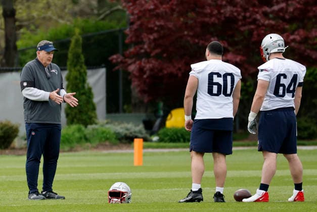 FOXBOROUGH, MA - MAY 09: Nate Azzopardi 60 of the New England Patriots and Jacob Rizy 64 of the New England Patriots work with New England Patriots offensive line coach Doug Marrone during New England Patriots rookie camp on May 9, 2026, at Gillette Stadium in Foxborough, Massachusetts. (Photo by Fred Kfoury III Icon Sportswire) NFL, American Football Herren, USA MAY 09 New England Patriots Workout EDITORIAL USE ONLY Icon482260509061