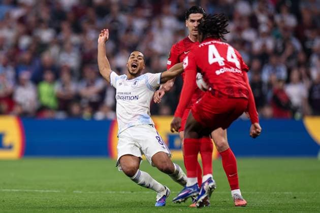 Youri Tielemans of Aston Villa goes down after a challenge from Igor Matanovic of SC Freiburg SC Freiburg v Aston Villa, UEFA Europa League, Final, Football, Besiktas Park, Istanbul, Turkiye - 20 May 2026Istanbul Besiktas Park United Kingdom EDITORIAL USE ONLY No use with unauthorised audio, video, data, fixture lists, club league logos or live services. Online in-match use limited to 120 images, no video emulation. No use in betting, games or single club league player publications.  Copyright: xRaddadxJebarah Shutterstockx 16883158ac