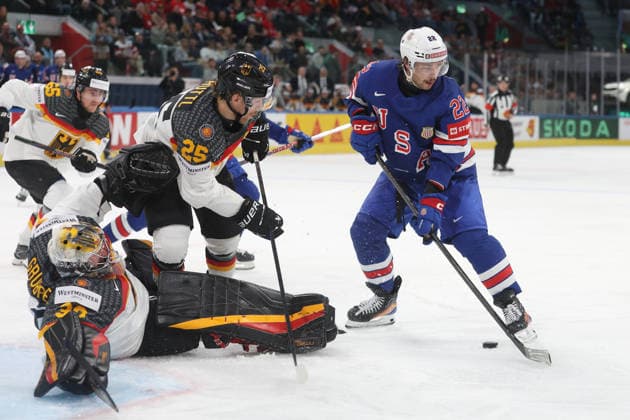 20 05 2026 Swiss Life Arena Zurich , SWITZERLAND, Men IIHF World Championship Zurich 2026 Group A USA Germany Goaltender Philipp Grubauer and Leon Huttl GER defend against Isaac Howard USA