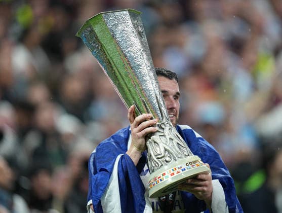 ISTANBUL, TURKEY - MAY 20: John McGinn of Aston Villa celebrates with the UEFA Europa League trophy after winning the UEFA Europa League Final 2026 match between SC Freiburg and Aston Villa FC at Besiktas Park on May 20, 2026 in Istanbul, Turkey.  Copyright: xMBxMediax
