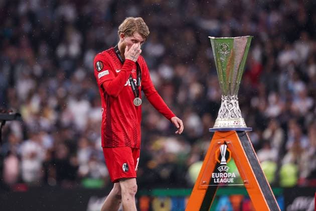 Jan-Niklas Beste of SC Freiburg walks past the Europa League trophy SC Freiburg v Aston Villa, UEFA Europa League, Final, Football, Besiktas Park, Istanbul, Turkiye - 20 May 2026Istanbul Besiktas Park United Kingdom EDITORIAL USE ONLY No use with unauthorised audio, video, data, fixture lists, club league logos or live services. Online in-match use limited to 120 images, no video emulation. No use in betting, games or single club league player publications.  Copyright: xRaddadxJebarah Shutterstockx 16883158fi