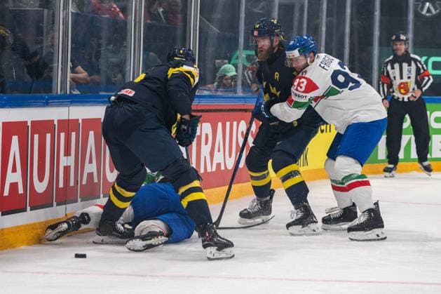 FRIBOURG, FRIBOURG - MAY 22: Jacob Larsson and Mattias Ekholm of Sweden battle with Luca Frigo and another Italy player, who lies on the ice, during the 2026 IIHF World Championship, WM, Weltmeisterschaft Preliminary Round Group B match between Sweden and Italy at BCF Arena on May 22, 2026 in Fribourg, Fribourg, Switzerland. Copyright: xLivioxBaeriswylx xSPPx Sportspressphoto_SPR151977