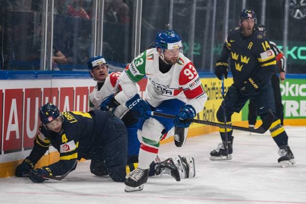 FRIBOURG, FRIBOURG - MAY 22: Luca Frigo of Italy skates away with the puck during the 2026 IIHF World Championship, WM, Weltmeisterschaft Preliminary Round Group B match between Sweden and Italy at BCF Arena on May 22, 2026 in Fribourg, Fribourg, Switzerland. Copyright: xLivioxBaeriswylx xSPPx Sportspressphoto_SPR151978