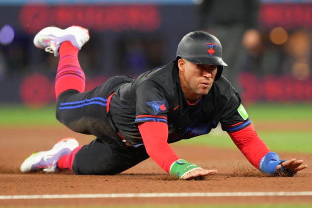 May 22, 2026, Toronto, On, CAN: Toronto Blue Jays George Springer (4) slides into third base against the Pittsburgh Pirates during third inning MLB, Baseball Herren, USA baseball action in Toronto on Friday, May 22, 2026. George Springer  - ZUMAc35_ 20260522_zaf_c35_138 Copyright: xChrisxYoungx