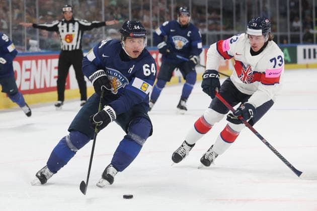 22 05 2026 Swiss Life Arena Zurich , SWITZERLAND, Mens Ice Hockey IIHF World Championship Zurich 2026 Group A FIN GBR Mikael Granlund FIN vs Joseph Hazeldine GBR