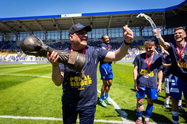 Jena , 230526, Final Soccer Thuringia Cup , FC Carl Zeiss Jena against ZFC Meuselwitz in the picture coach Volkan Uluc Jena with cup