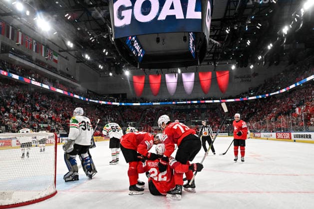 ZURICH, SWITZERLAND MAY 23 Nino Niederreiter of Switzerland C celebrates a goal that will be later disallowed with Christoph Bertschy of Switzerland L and Calvin Thurkauf of Switzerland R during the 2026 IIHF Ice Hockey World Championship Switzerland game between Switzerland and Hungary at Swiss Life Arena on May 23, 2026 in Zurich, Zurich Zurich Swiss Life Arena Zurich Switzerland Copyright: xJustPictures.ch AndreaxBrancax jp-en-EuSpIm-JP7_ANB_Sui_Hung_23052026_1275