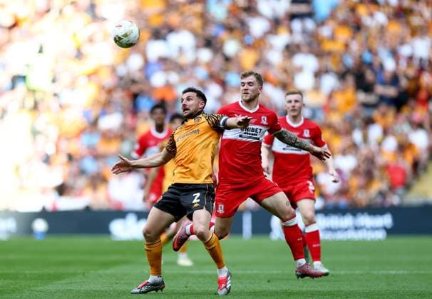 Lewis Coyle of Hull City in action against Riley McGree of Middlesbrough Hull City v Middlesbrough, EFL Sky Bet Championship, Play-Off Final, Football, Wembley Stadium, London, UK - 23 May 2026London Wembley Stadium United Kingdom EDITORIAL USE ONLY No use with unauthorised audio, video, data, fixture lists, club league logos or live services. Online in-match use limited to 120 images, no video emulation. No use in betting, games or single club league player publications.  Copyright: xSimonxDael Shutterstockx 16887368cp